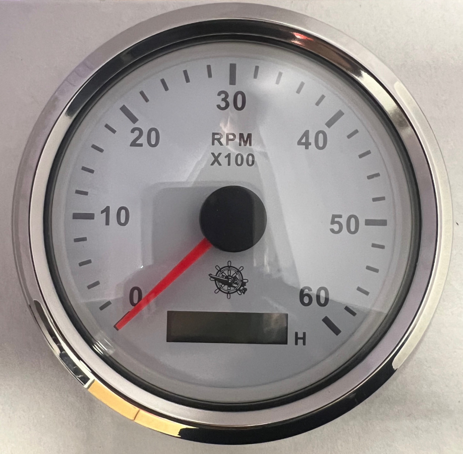 Tahometrs 0-6000 RPM balts/hroms (Ar stundu skaitītāju 12/24V)